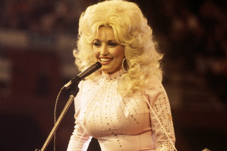 Dolly Parton with a microphone