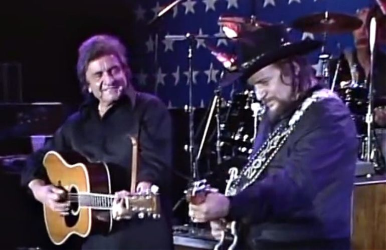 Johnny Cash et al. playing guitars