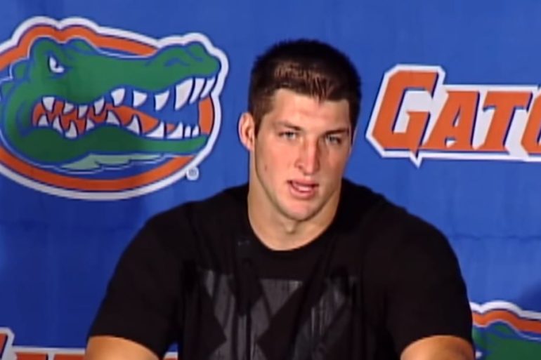 Tim Tebow in a black shirt