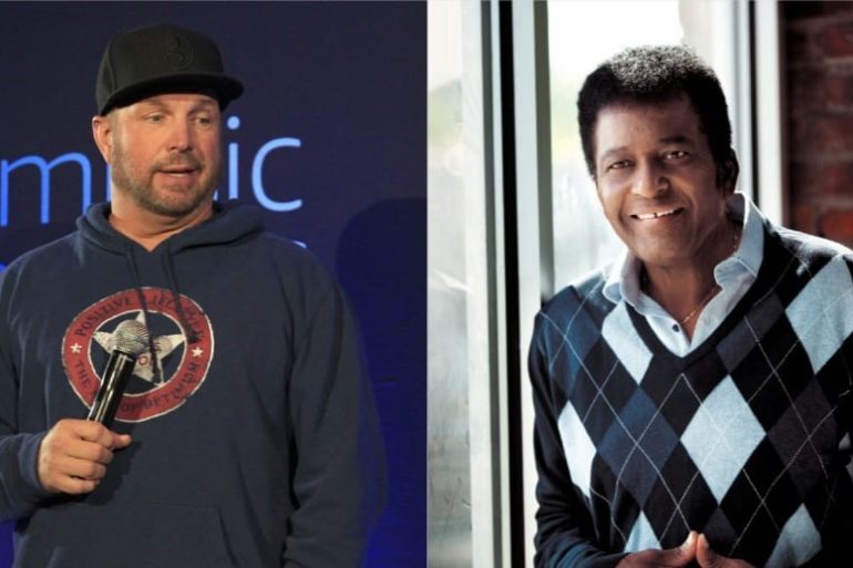Charley Pride, Garth Brooks are posing for a picture