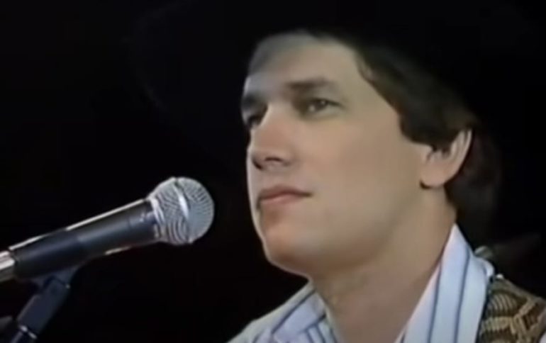 George Strait with a microphone