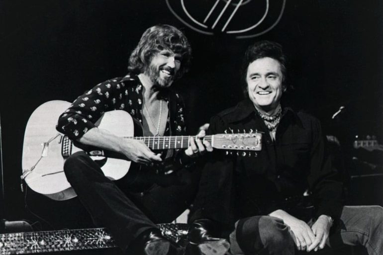 Johnny Cash, Kris Kristofferson playing guitars