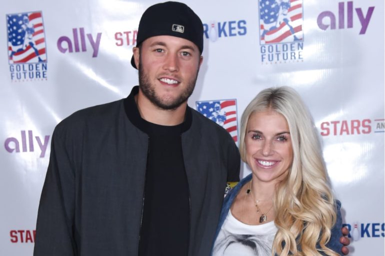 Matthew Stafford and woman posing for a picture