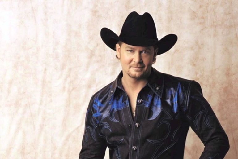 Tracy Lawrence wearing a hat