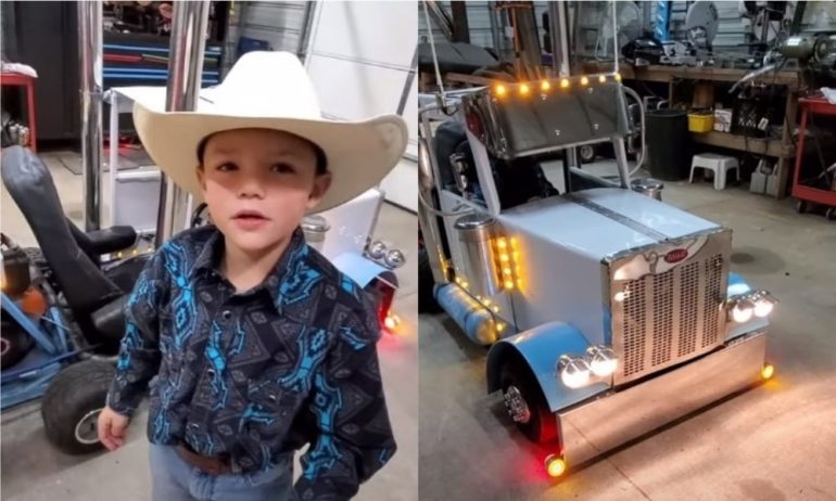 A child wearing a cowboy hat and standing next to a toy truck