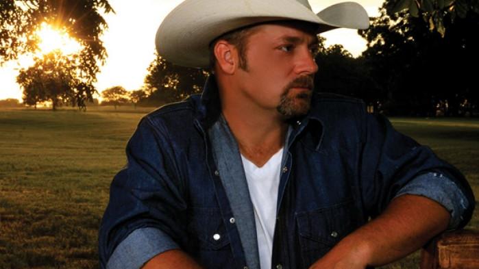 Chris Cagle sitting on a bench