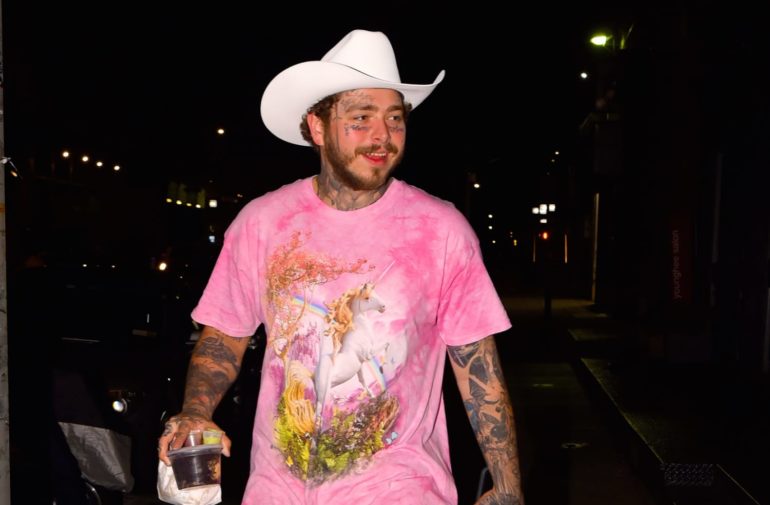 Post Malone wearing a cowboy hat