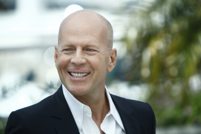 Bruce Willis smiling for the picture