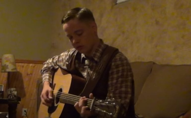 A person playing a guitar