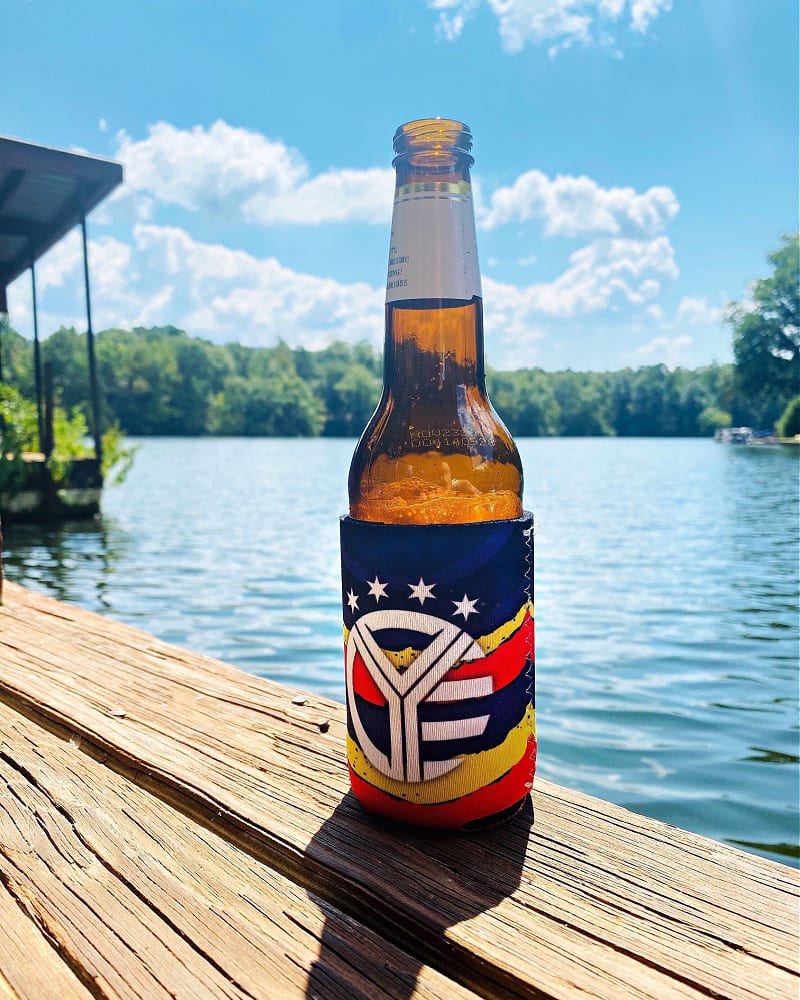 A beer bottle on a dock