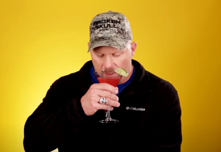 Steve Austin drinking from a glass
