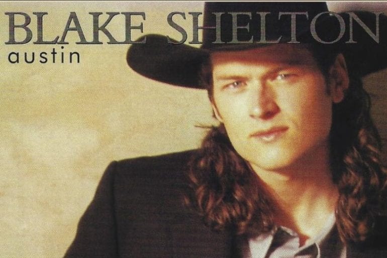 Blake Shelton with long hair and a hat