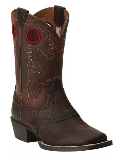 A brown boot with a red and black design