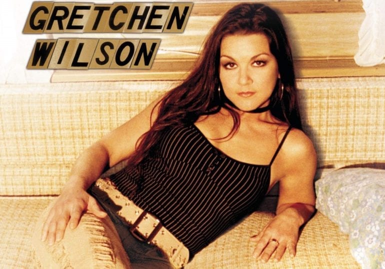 Gretchen Wilson sitting on a couch