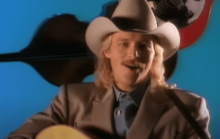 Alan Jackson wearing a suit and tie
