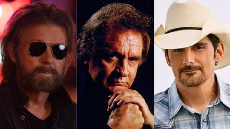 Johnny Cash, Ronnie Dunn, Brad Paisley are posing for a picture