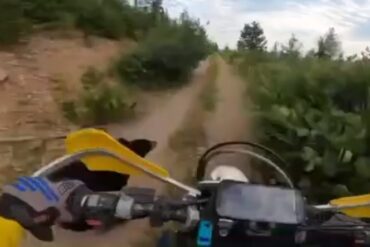 A motorcycle on a dirt road
