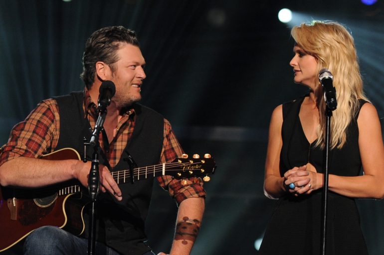 Blake Shelton and woman on stage