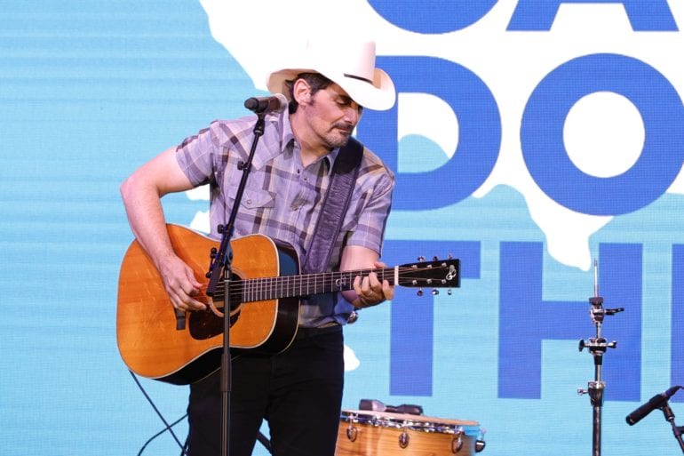 A man playing a guitar