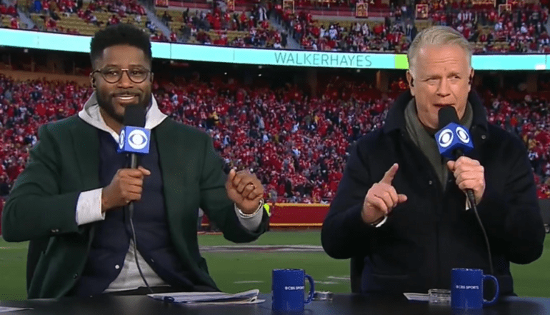 Boomer Esiason, Nate Burleson are posing for a picture