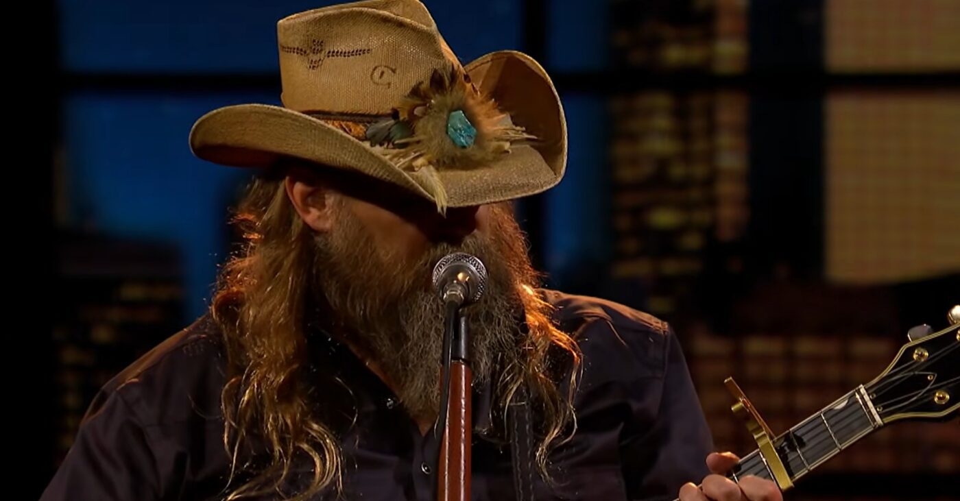 Chris Stapleton Delivers Statement Performance Of Willie Nelson’s “Living In The Promiseland” On Colbert