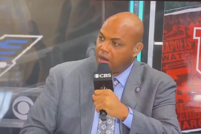 Charles Barkley holding a microphone