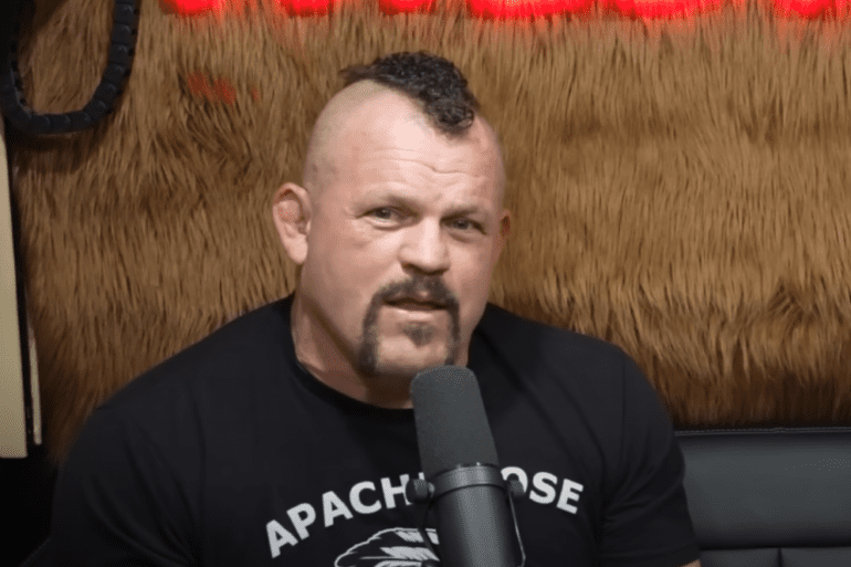Chuck Liddell speaking into a microphone