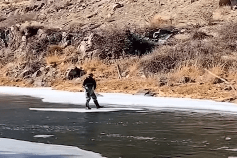 A person is water skiing