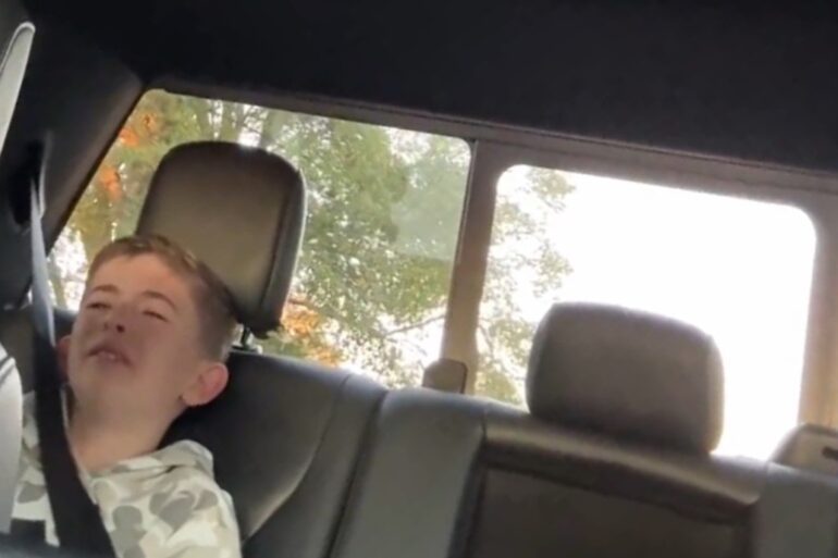 Kid crying in the truck