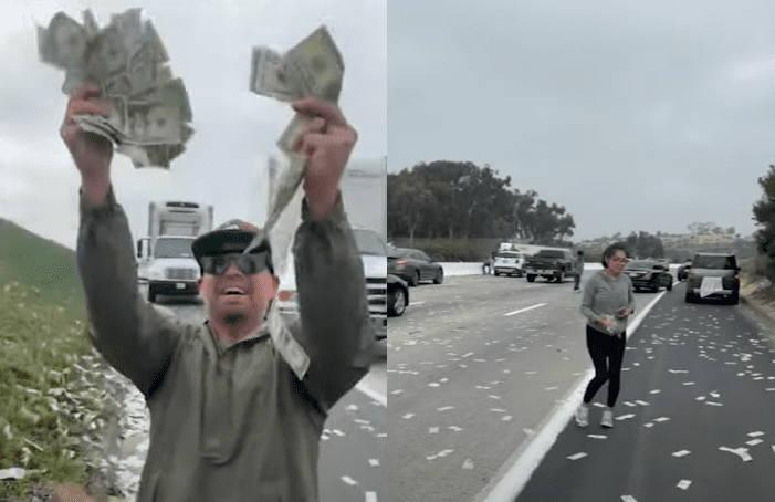 A man holding up a paper money