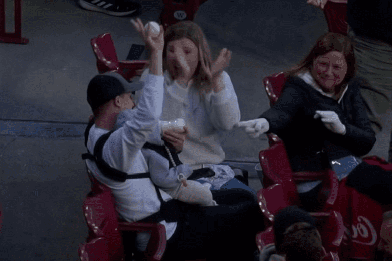 A group of people sitting in chairs