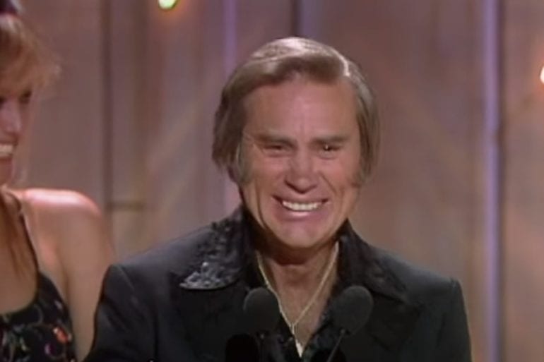 George Jones smiling at another woman