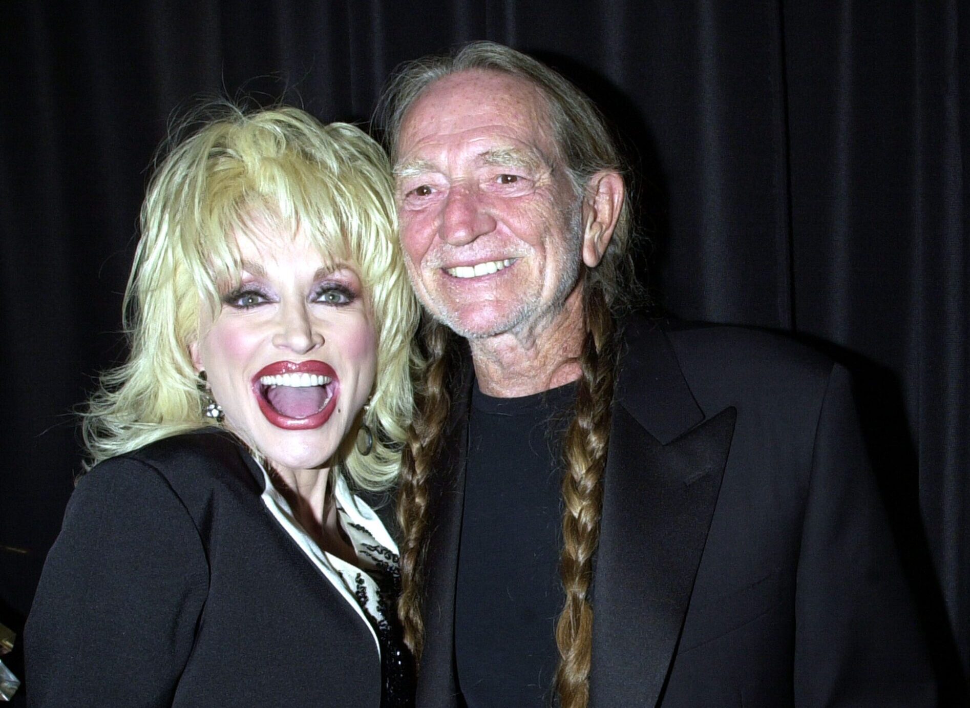 is dolly parton a cigarette smoker Dolly Parton Says You're “Automatically High” The Second You Get On Willie  Nelson's Tour Bus
