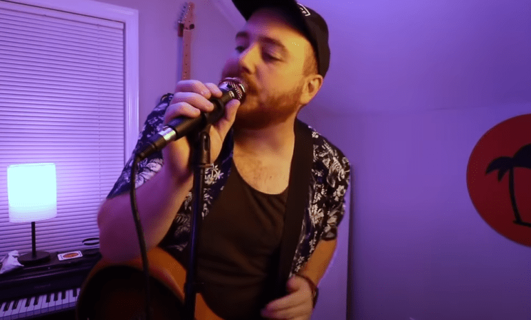 A person singing into a microphone