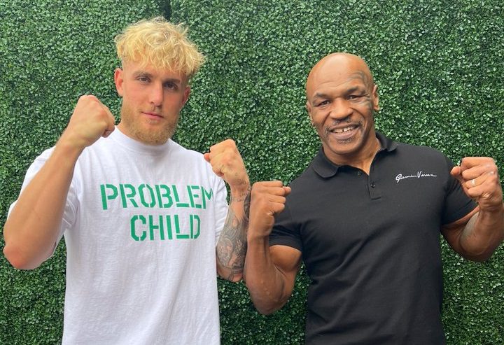 Mike Tyson, Jake Paul are posing for a picture