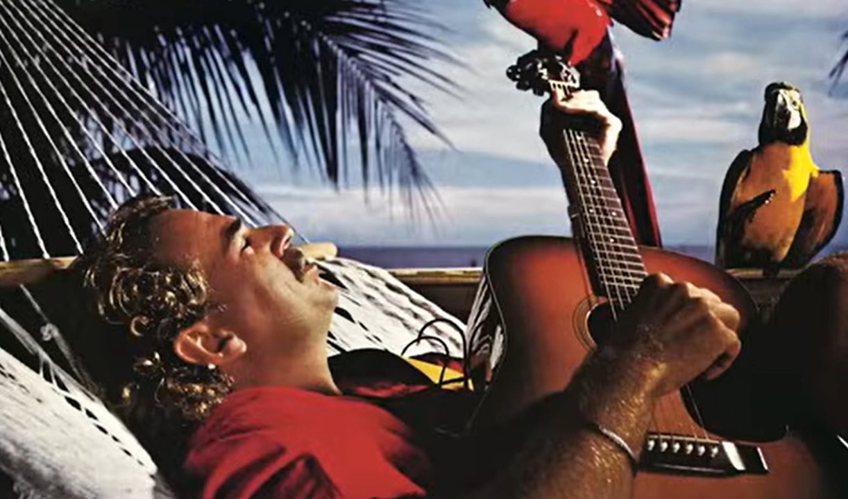 What Is “Jimmy Buffett Maxxing”? Why The Margaritaville Mindset Is Taking Over the Internet