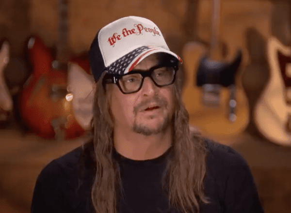 Kid Rock wearing glasses and a hat