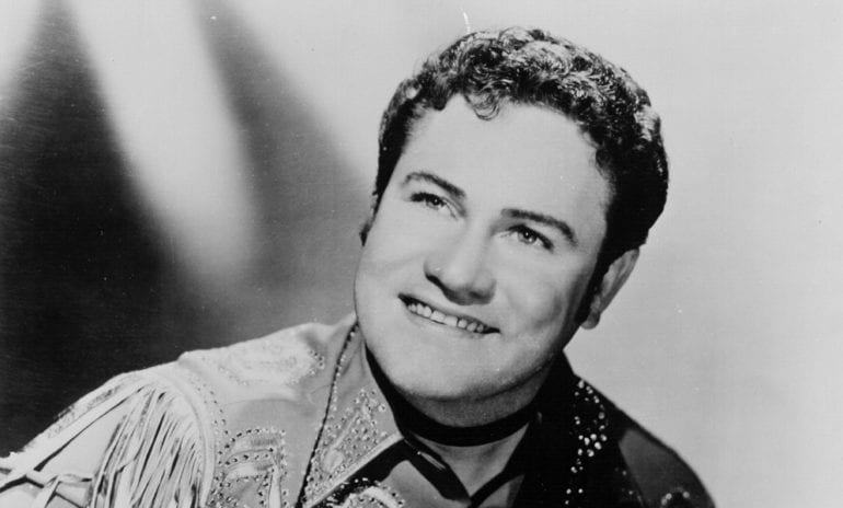 Lefty Frizzell smiling for the camera