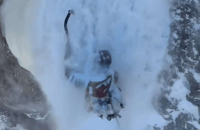 A person skiing down a mountain