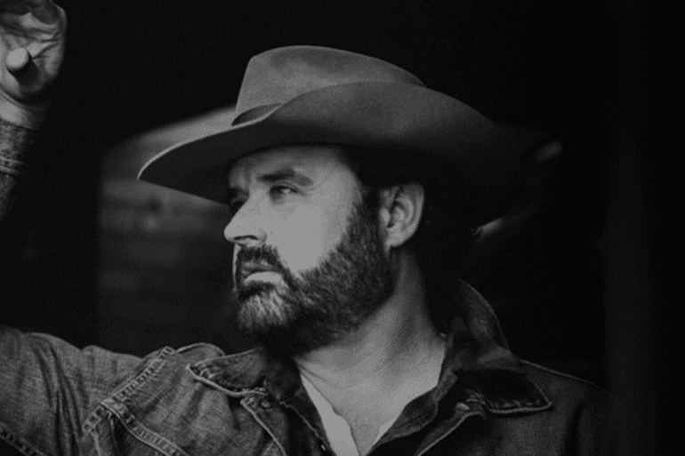 Randy Houser wearing a hat