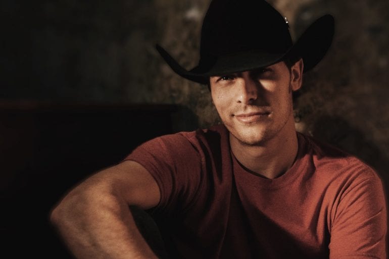 A man wearing a cowboy hat