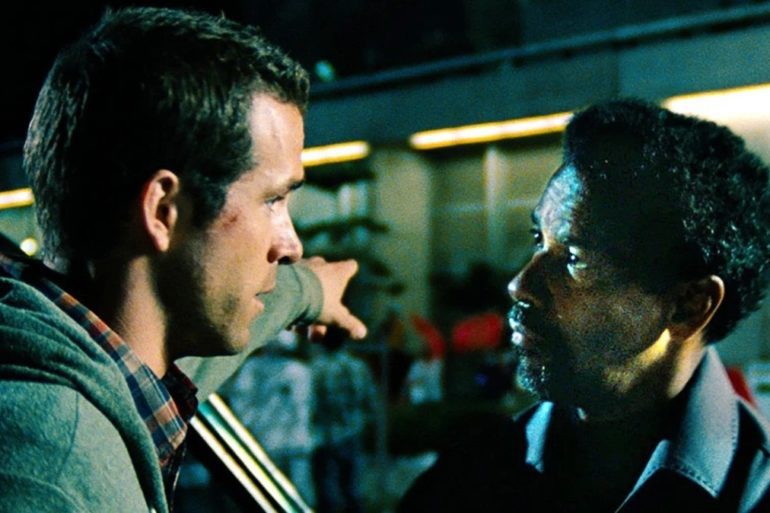 A man looking at another man