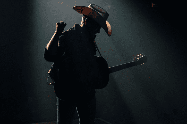 A person holding a microphone