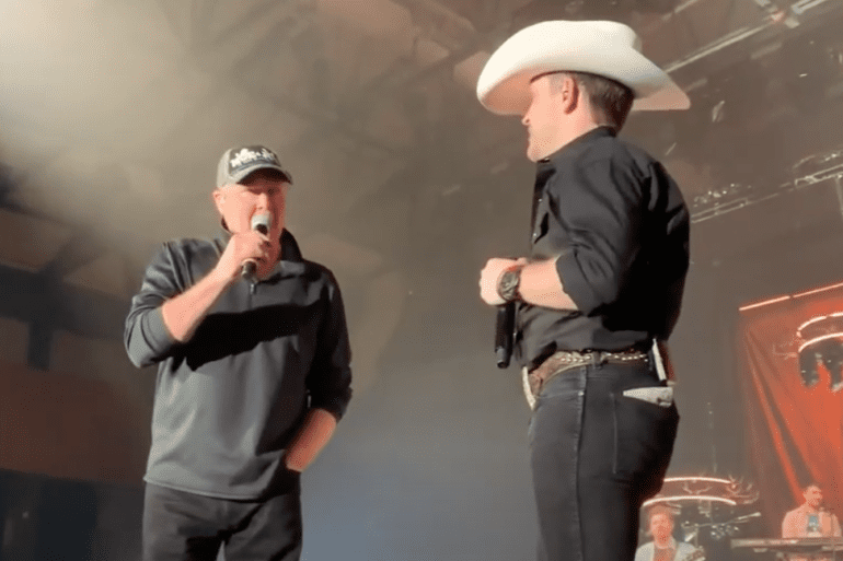 Two men wearing cowboy hats