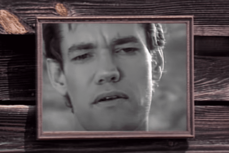 A framed picture of Randy Travis