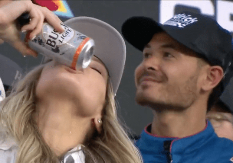 Kyle Larson drinking from a bottle
