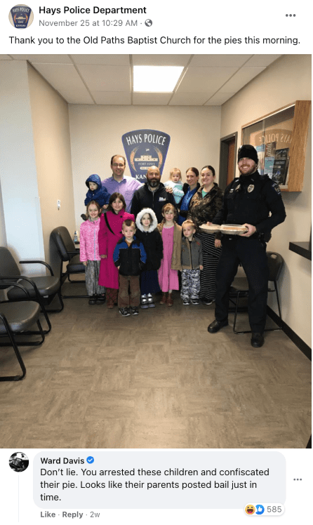 A person standing in front of a group of children