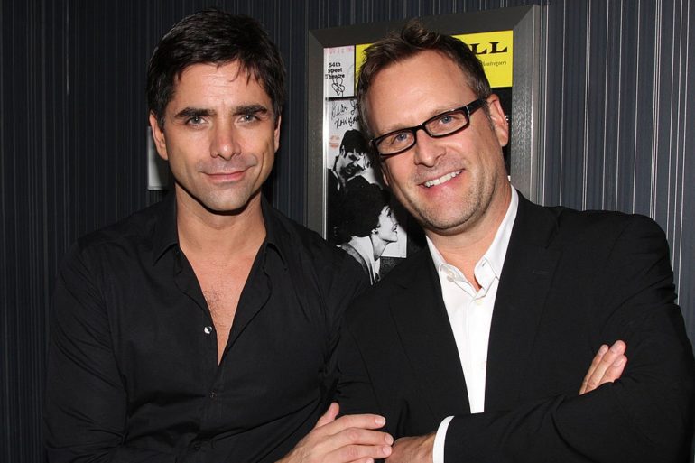 Dave Coulier, John Stamos are posing for a picture