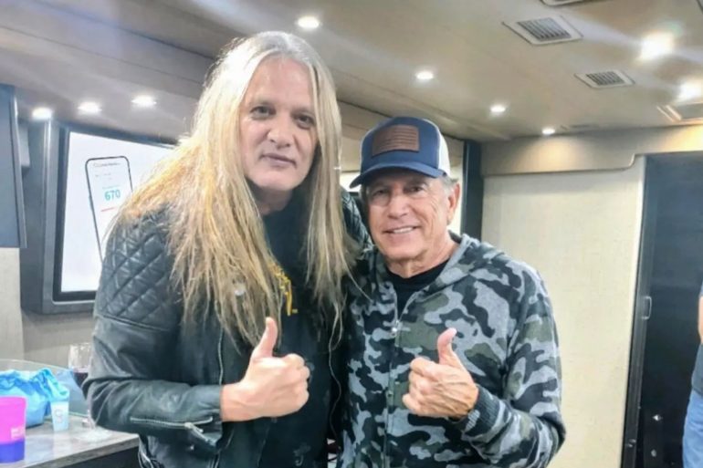 Sebastian Bach, George Strait are posing for a picture