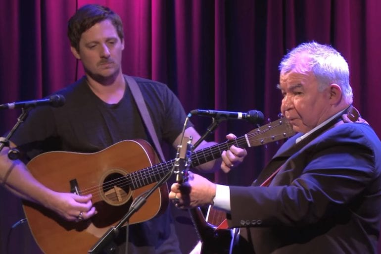 John Prine, Sturgill Simpson are posing for a picture
